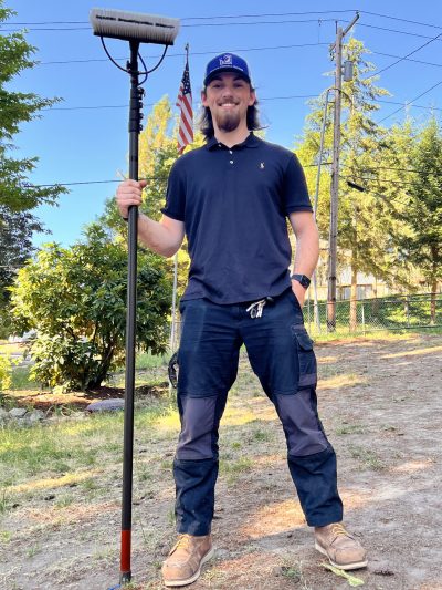 Brody Hunter posing before window cleaning.
