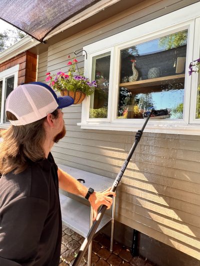 Window cleaning on the exterior of a home.