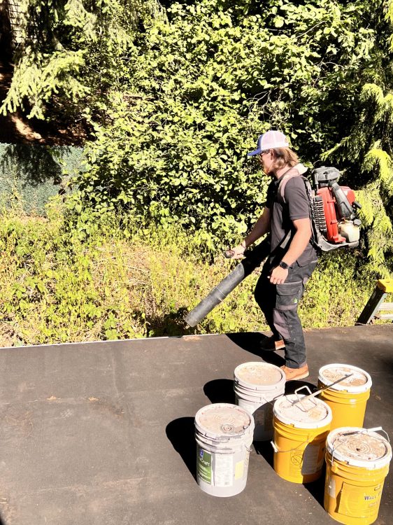 Gutter cleaning service to clear debris out of the gutters.